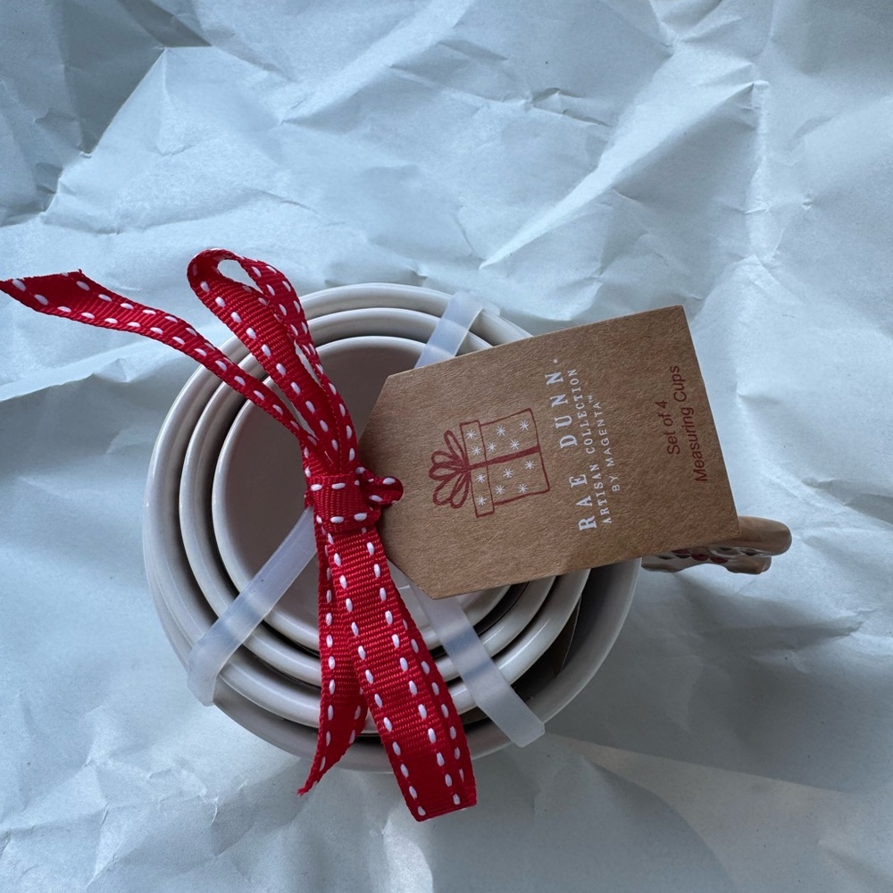 Rae Dunn gingerbread and candy cane measyring cups - Picture 2 of 3